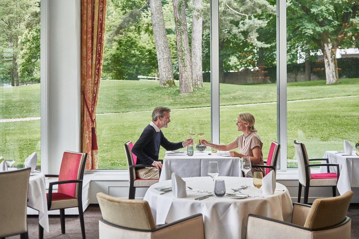 A couple having lunch together at the Olives d'Or restaurant.