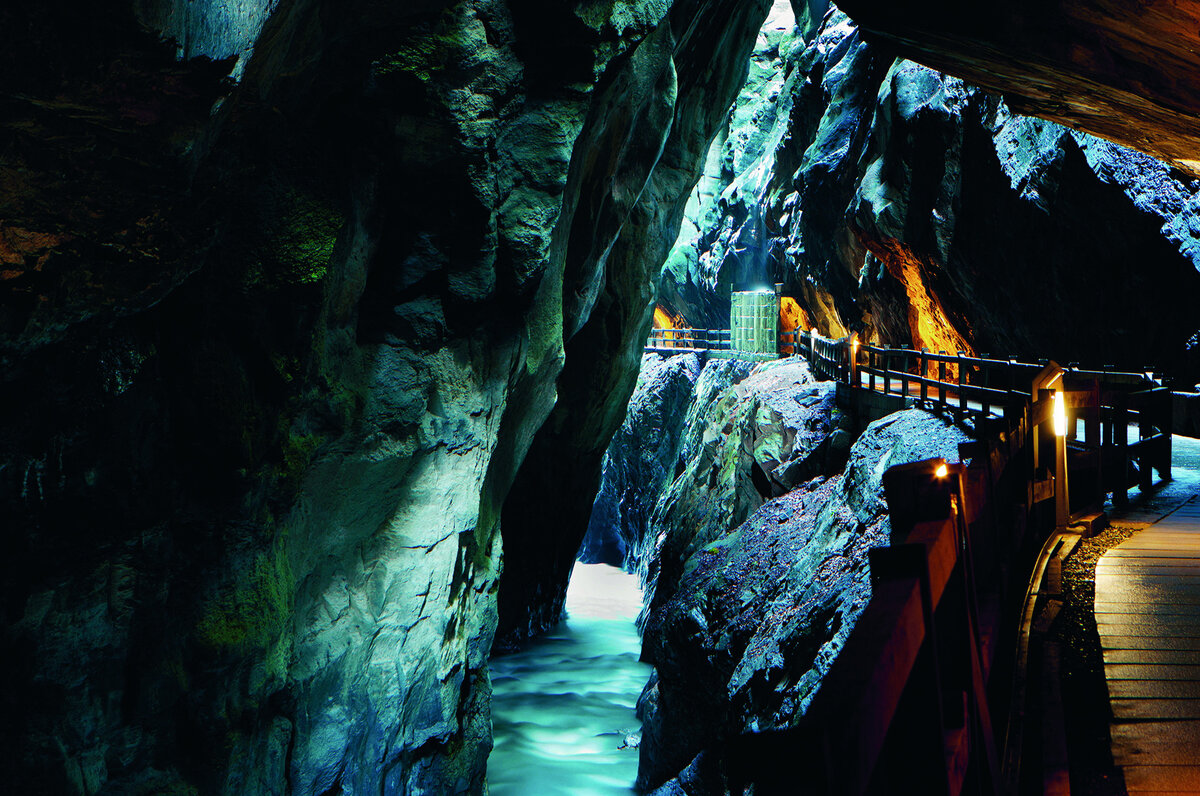 The Tamina Gorge in Bad Ragaz illuminated with warm light.