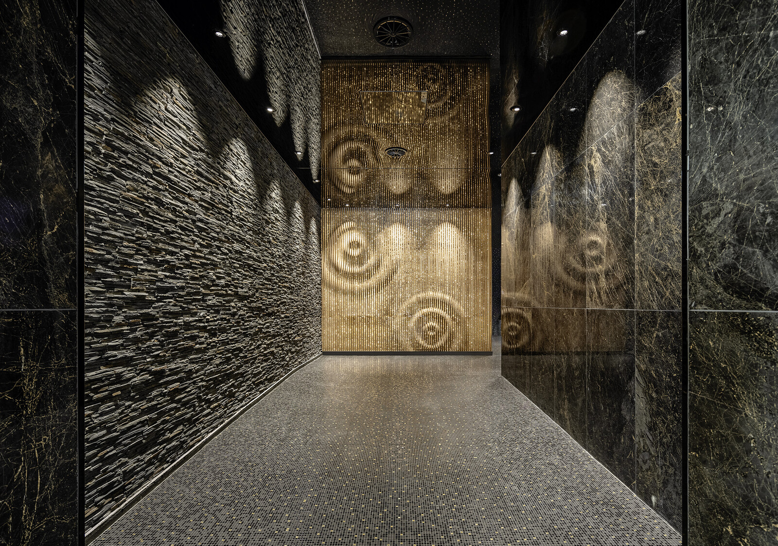 Entrance to the sauna world of Tamina Therme with gold decorated walls